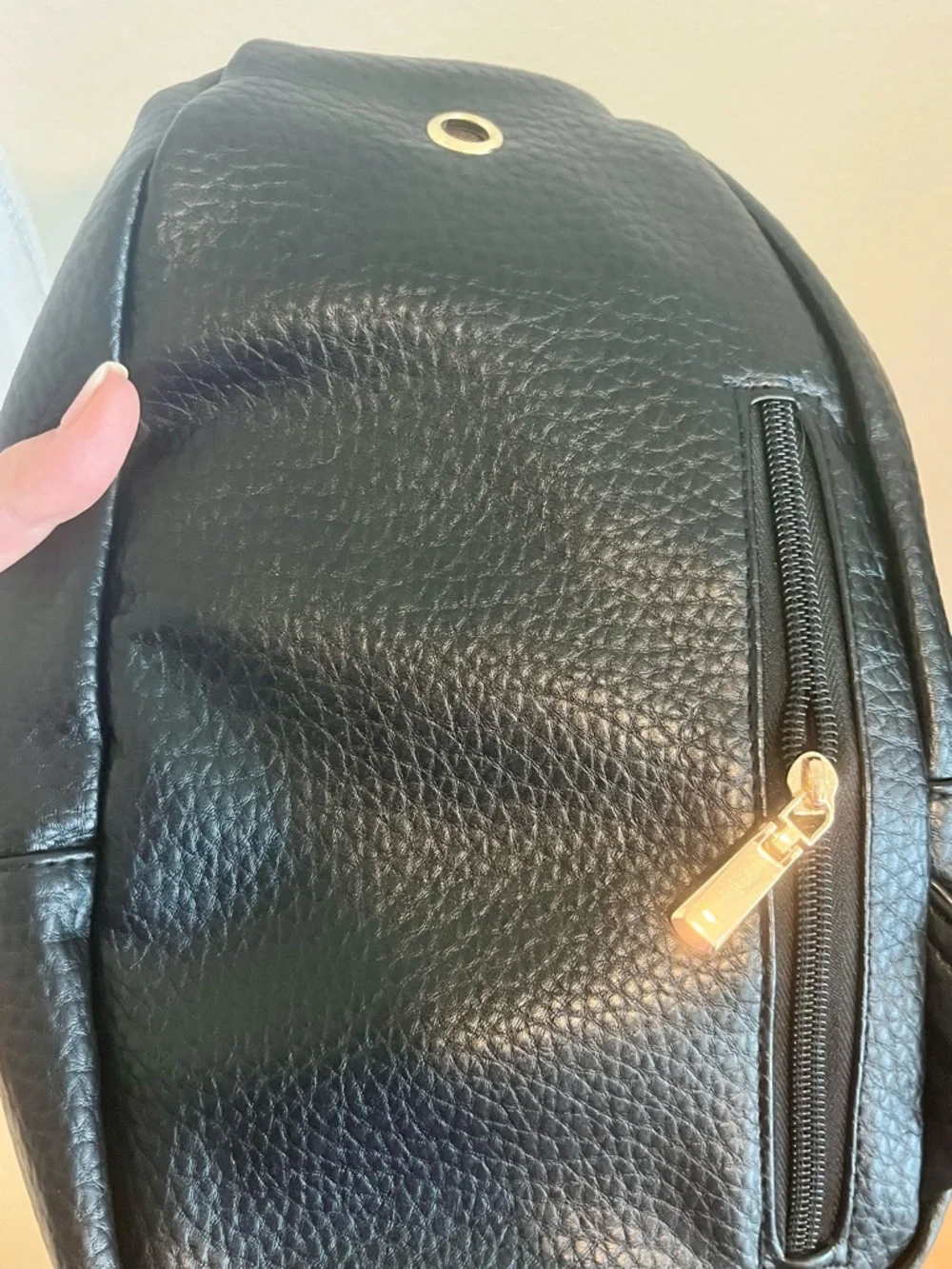 Black Crossbody Sling Backpack Bag with Patterned Strap